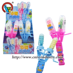 Rotate double toy lollipop hard candy